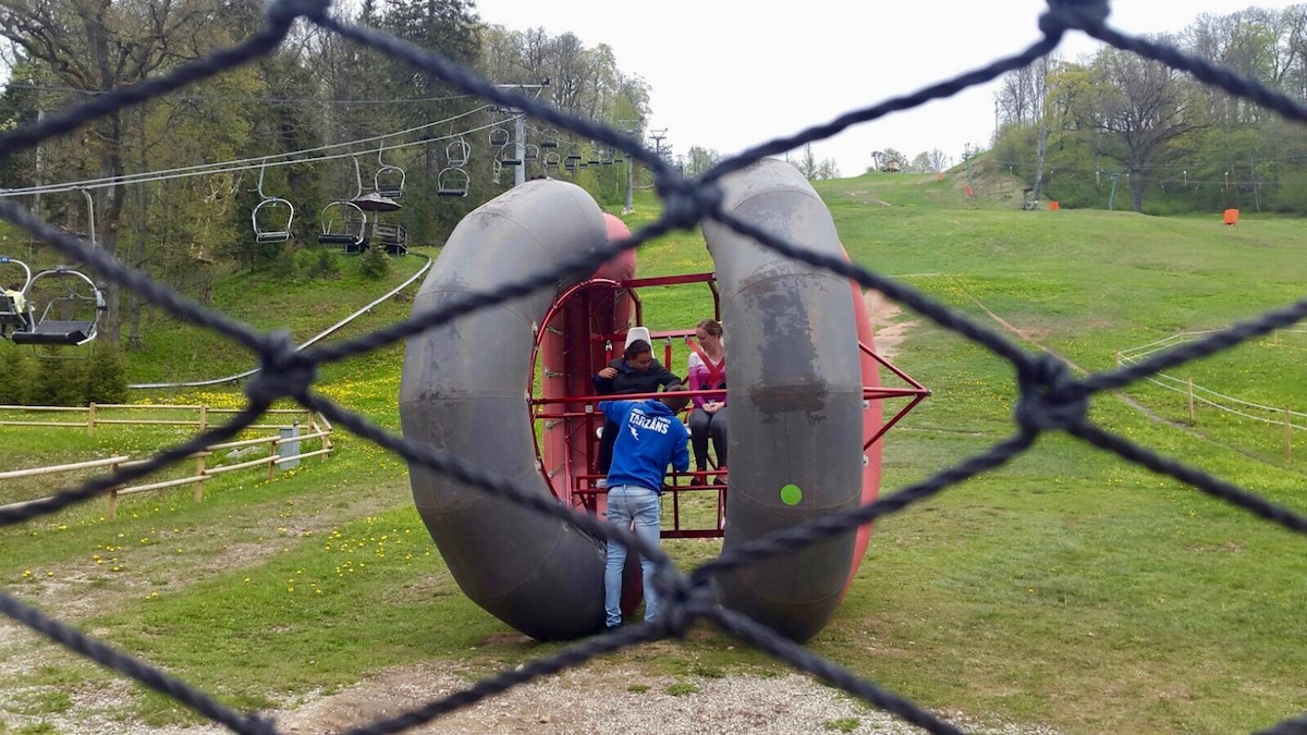 Sigulda isn't just a day trip from Riga: it's charming nature and adventure-filled town worthy of at least a couple of days. Don't believe me? Click to read about all the things to do in Sigulda, Latvia! | https://passportandplates.com