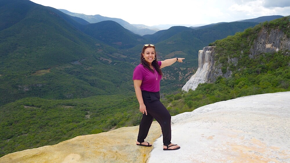 Standing in front of Hierve el Agua in Mexico